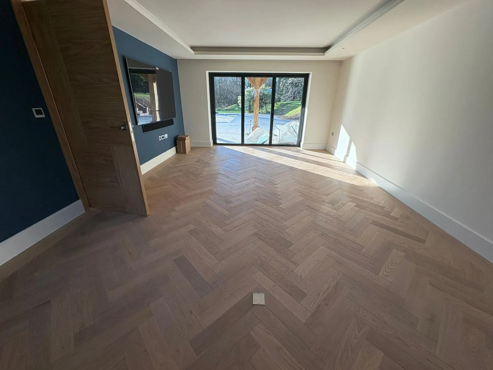 Herringbone oak floor fitted labour-only in a family room | Northfold Flooring