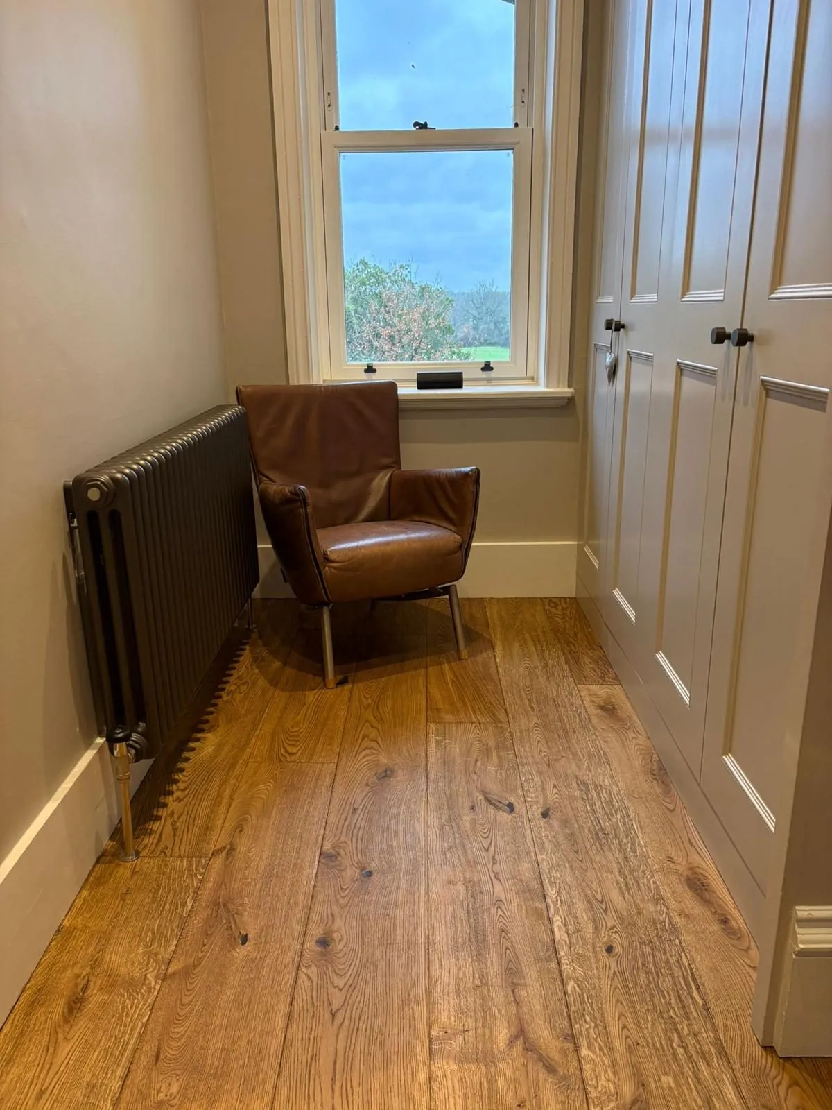 Wide plank oak flooring fitted in a dressing room | Northfold Flooring