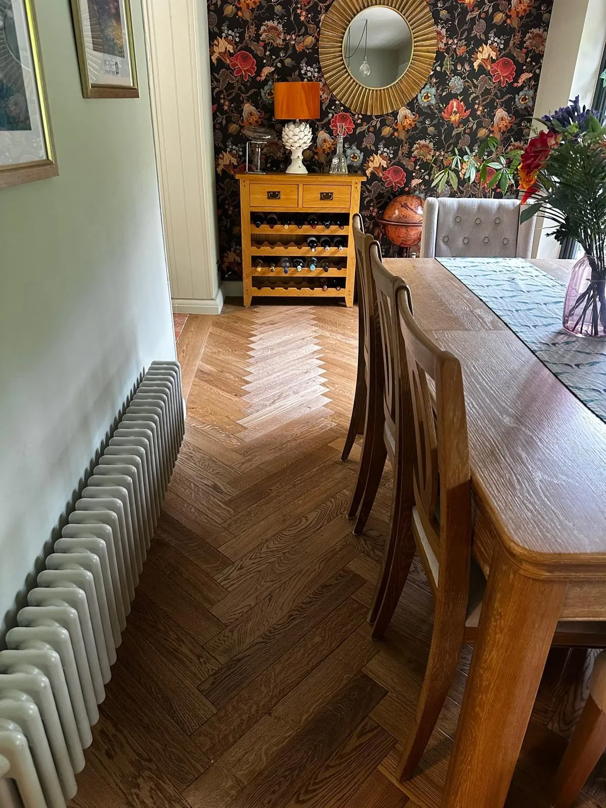 Smoked herringbone oak flooring in a dining room | Northfold Flooring