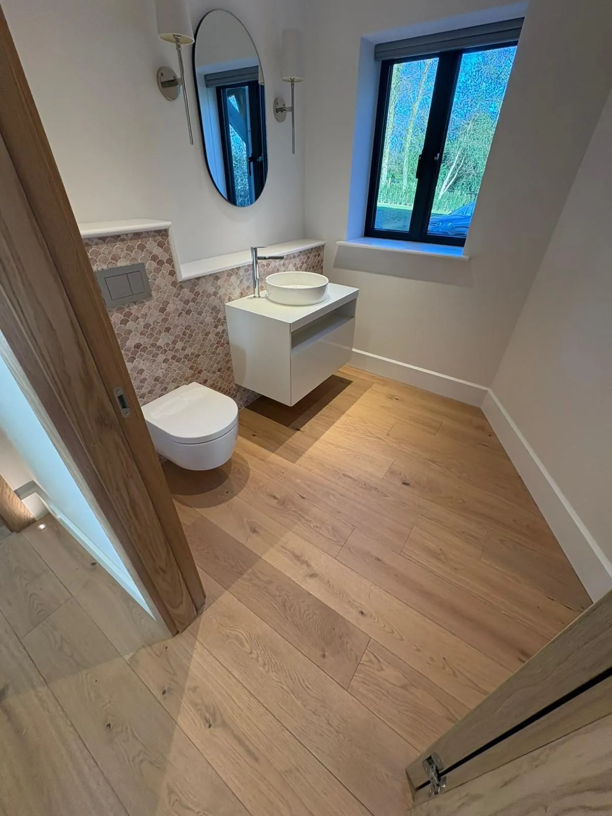 Engineered oak plank flooring installed in a modern cloakroom | Northfold Flooring